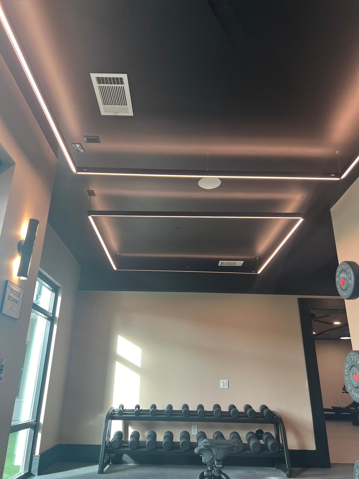 Architectural lighting installation in a gym